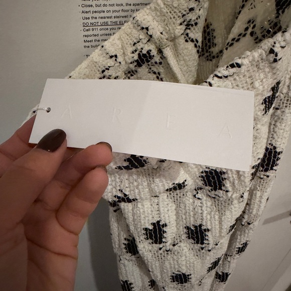 AREA eye crochet knit pants featuring crystal flower applique - Picture 9 of 12